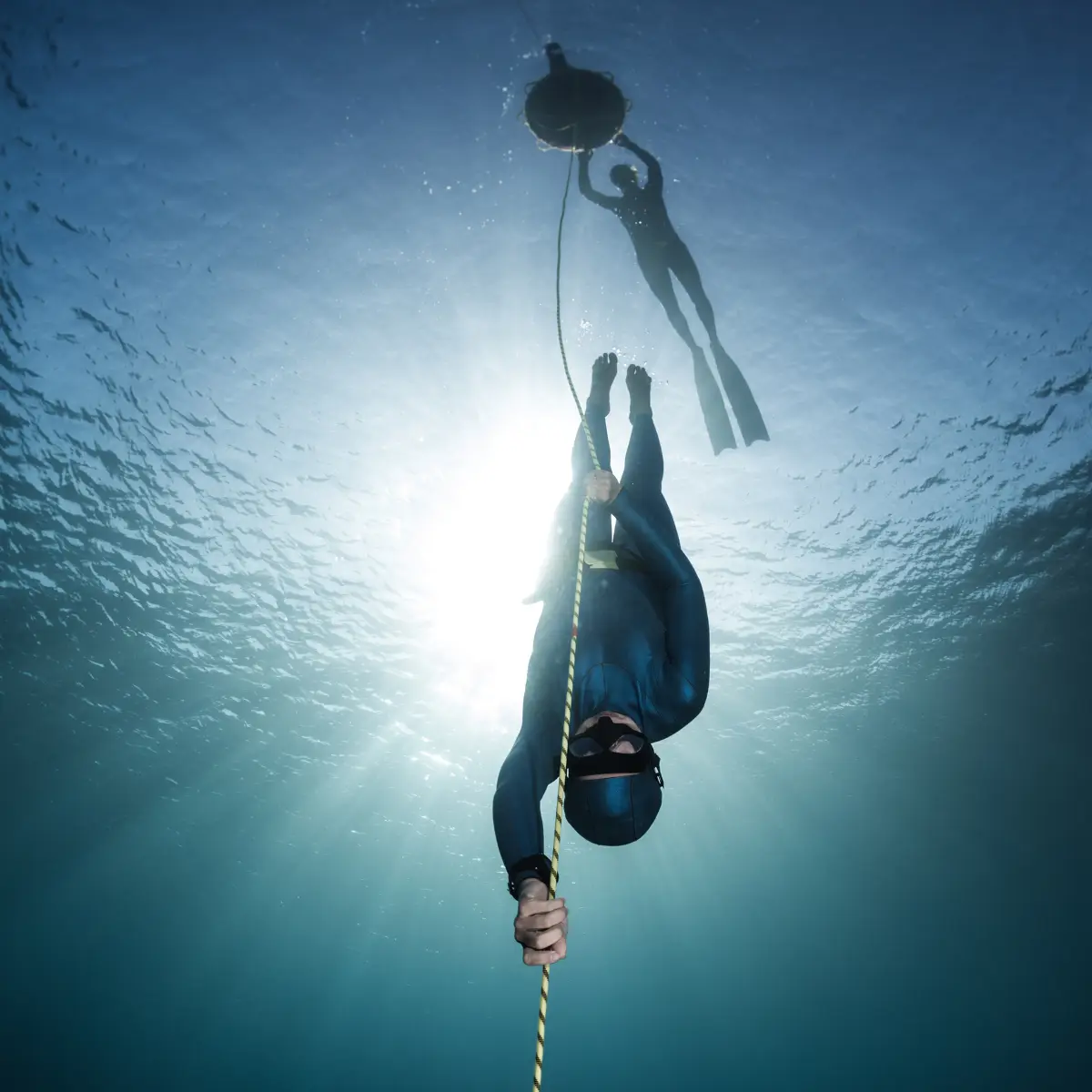 A freediver floating calmly beneath the surface in Boracay
