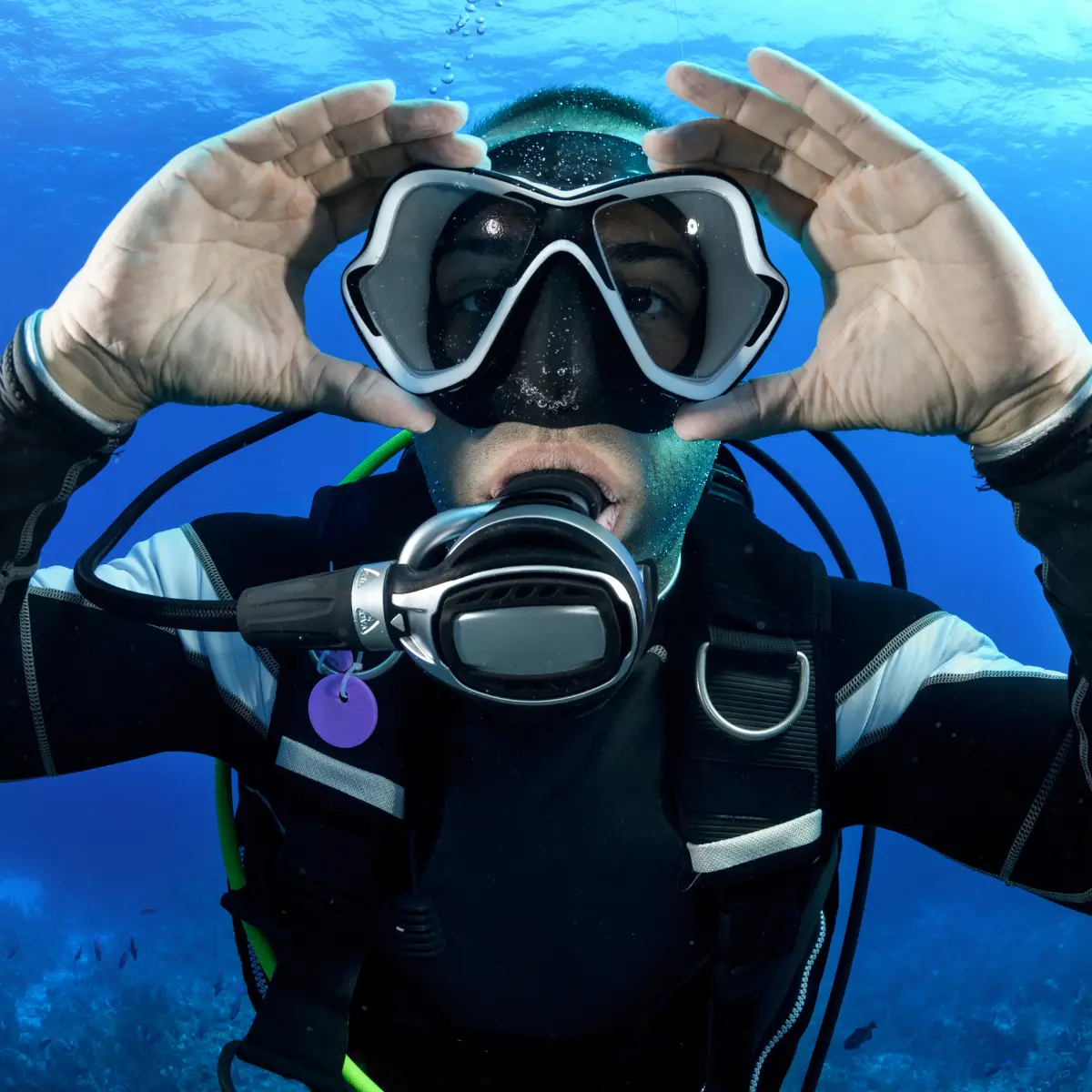 Two divers exploring a Boracay reef together