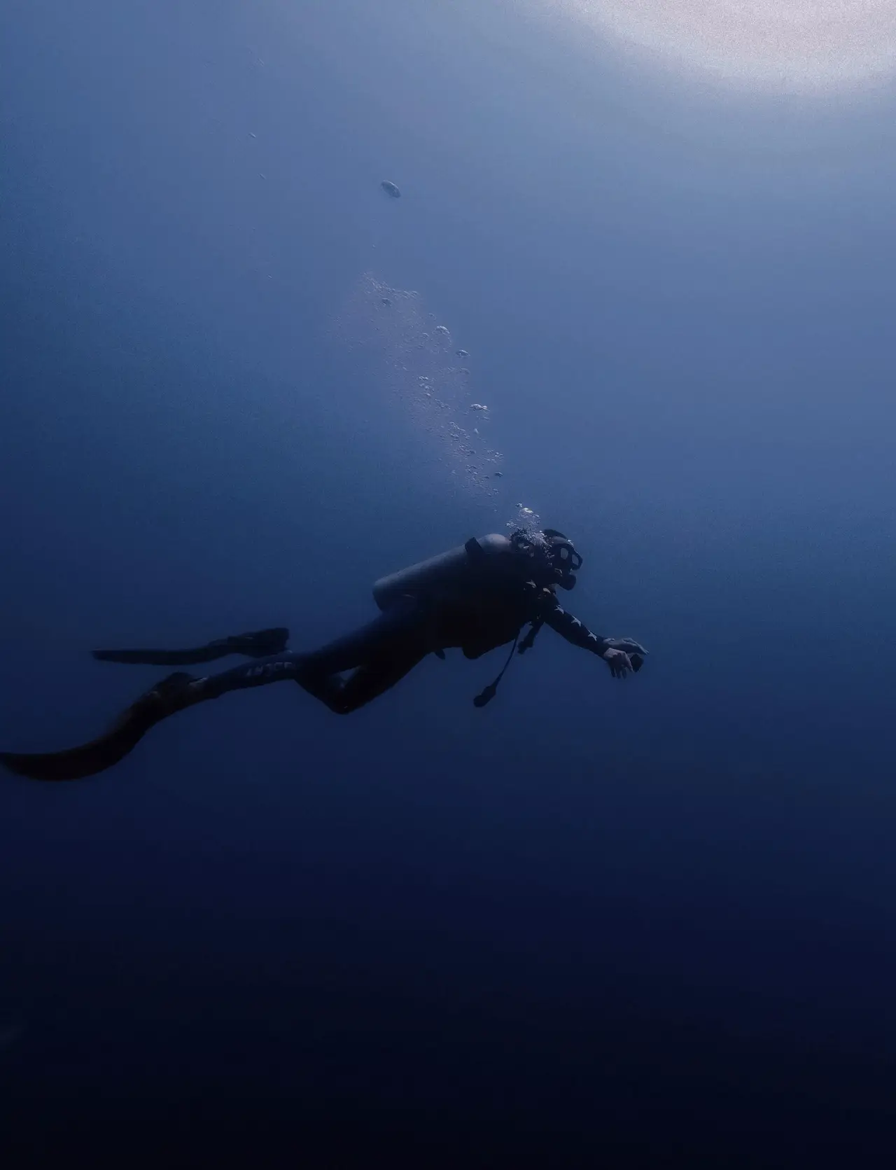 A diver exploring deeper water on a Boracay reef