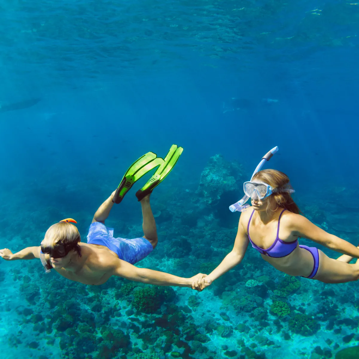 Divers exploring a Boracay reef together